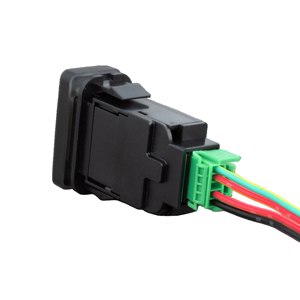 Black Toyota-fit switch seen from behind at an angle, the moulded body with its retaining tabs and a green connector carrying green, red, red and black wires