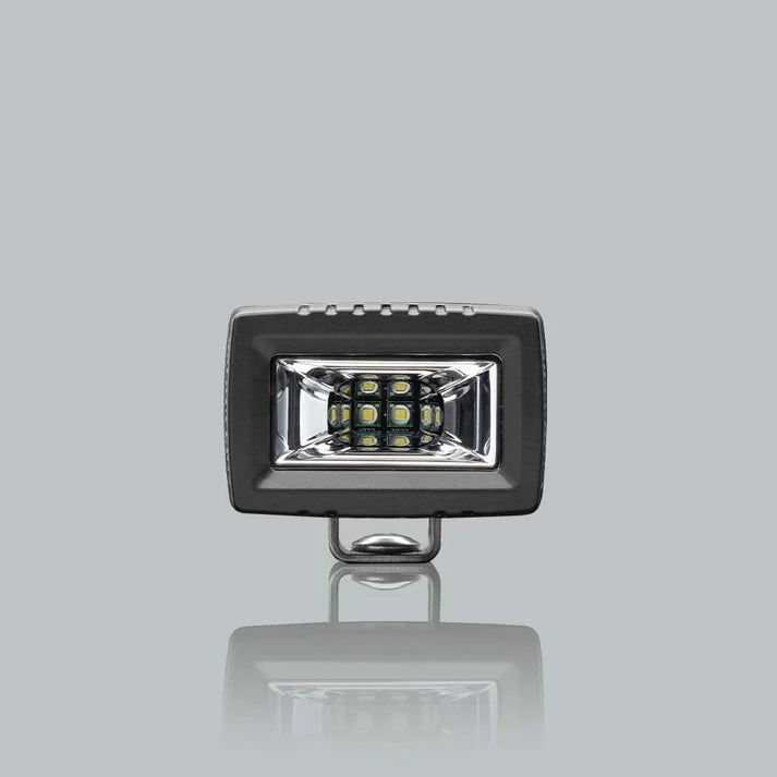 ALTIQ CX2 work light square on to the lens, the reflector with two rows of LEDs behind a clear cover, in a black housing with the mounting bracket beneath