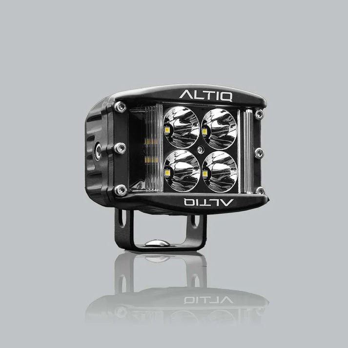 ALTIQ DX4 hybrid work light face on, four round spot reflectors in the centre flanked by two vertical flood strips, with the ALTIQ name above and below the lens