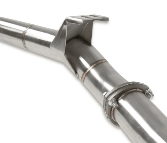 Close-up of a metallic exhaust pipe with a white background