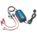 A Victron Blue Smart IP65 Charger with built-in Bluetooth, featuring red and black crocodile clips and a power cable.