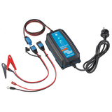 A Victron Blue Smart IP65 Charger with built-in Bluetooth, featuring red and black crocodile clips and a power cable.