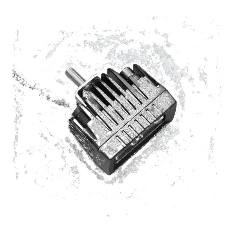 ALTIQ CX2 work light from above and behind, showing the finned cast heatsink, the threaded mounting stud and the cable leaving the rear