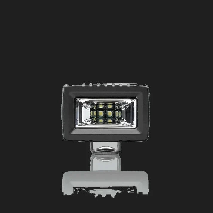 ALTIQ CX2 work light square on to the lens, a wide rectangular reflector holding a dense block of nine LEDs behind a clear cover, with the mounting bracket beneath