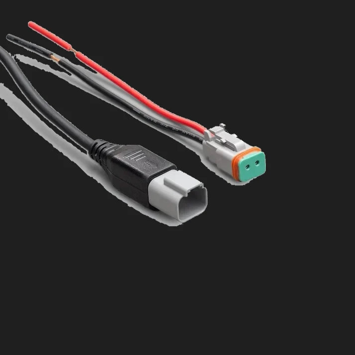 Two-way lead for the work light, a moulded plug at one end and a grey Deutsch DT connector at the other, alongside a matching Deutsch plug with bare red and black tails