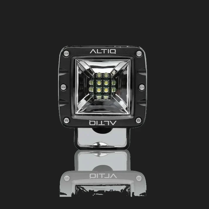 ALTIQ DX4 Scene work light in black, a square reflector holding nine LEDs behind a clear lens with the ALTIQ name above and below