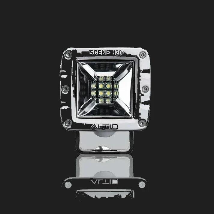 White DX4 Scene work light face on, the bezel marked SCENE 120 degrees above the square reflector and its nine LEDs, with the ALTIQ name below
