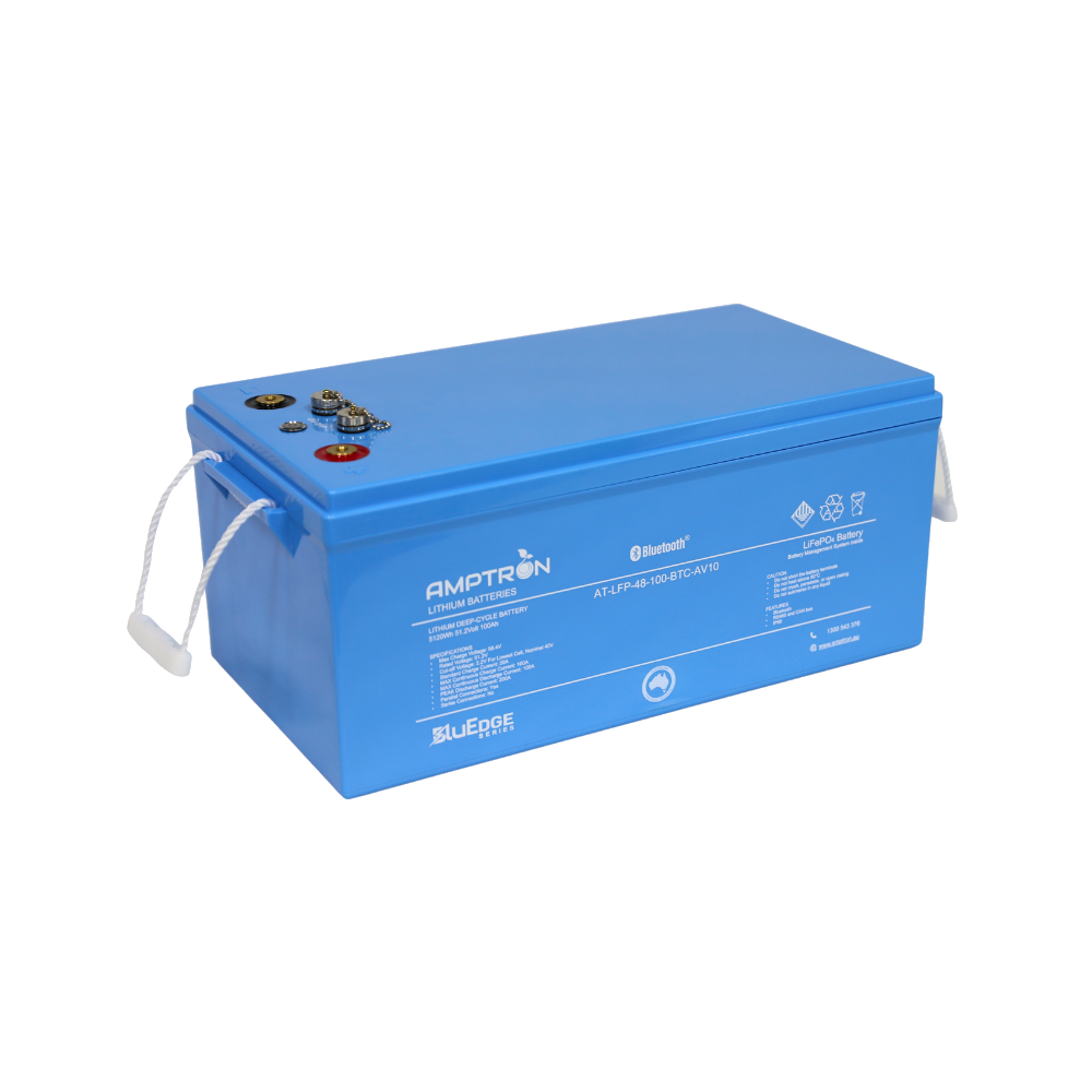 Amptron BluEdge AT-LFP-48-100-BTC-AV10 battery at a three-quarter angle, 5120Wh 51.2 Volt 100Ah, the deep blue case with rope handles at each end and the terminal and communication cluster on the top face