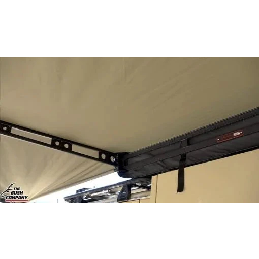 Close-up of a tent roof with a metal bracket and 'The Bush Company' logo.