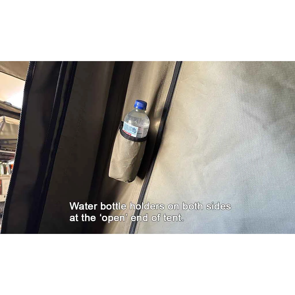 Water bottle holder on a tent with text indicating it's at the 'open' end of the tent.