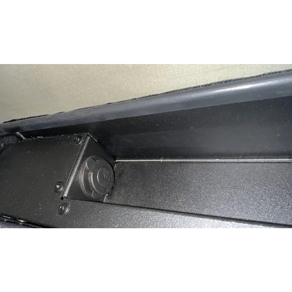 Close-up of a car door panel with a focus on the edge and trim – Bush Company LX27 Gen2 Lightweight Clamshell Rooftop Tent