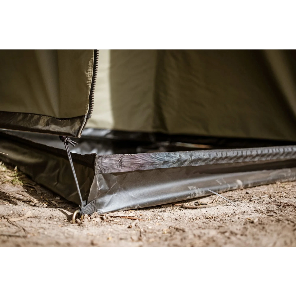 Close-up of a tent's groundsheet on a camping site