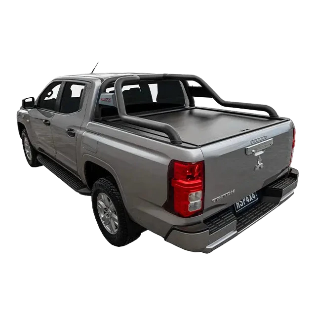 Gray pickup truck with a tonneau cover on a white background – HSP Electric Roller Cover Mitsubishi Triton MV