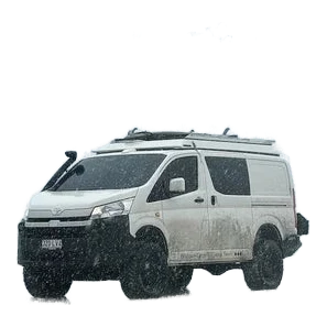 White van on a rainy landscape – Headspace Roof Conversion HiAce