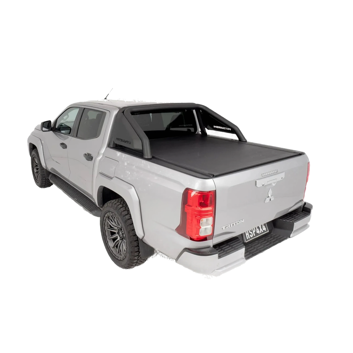 Gray pickup truck with a black tonneau cover on a white background – HSP Roll Mate Mitsubishi Triton MV
