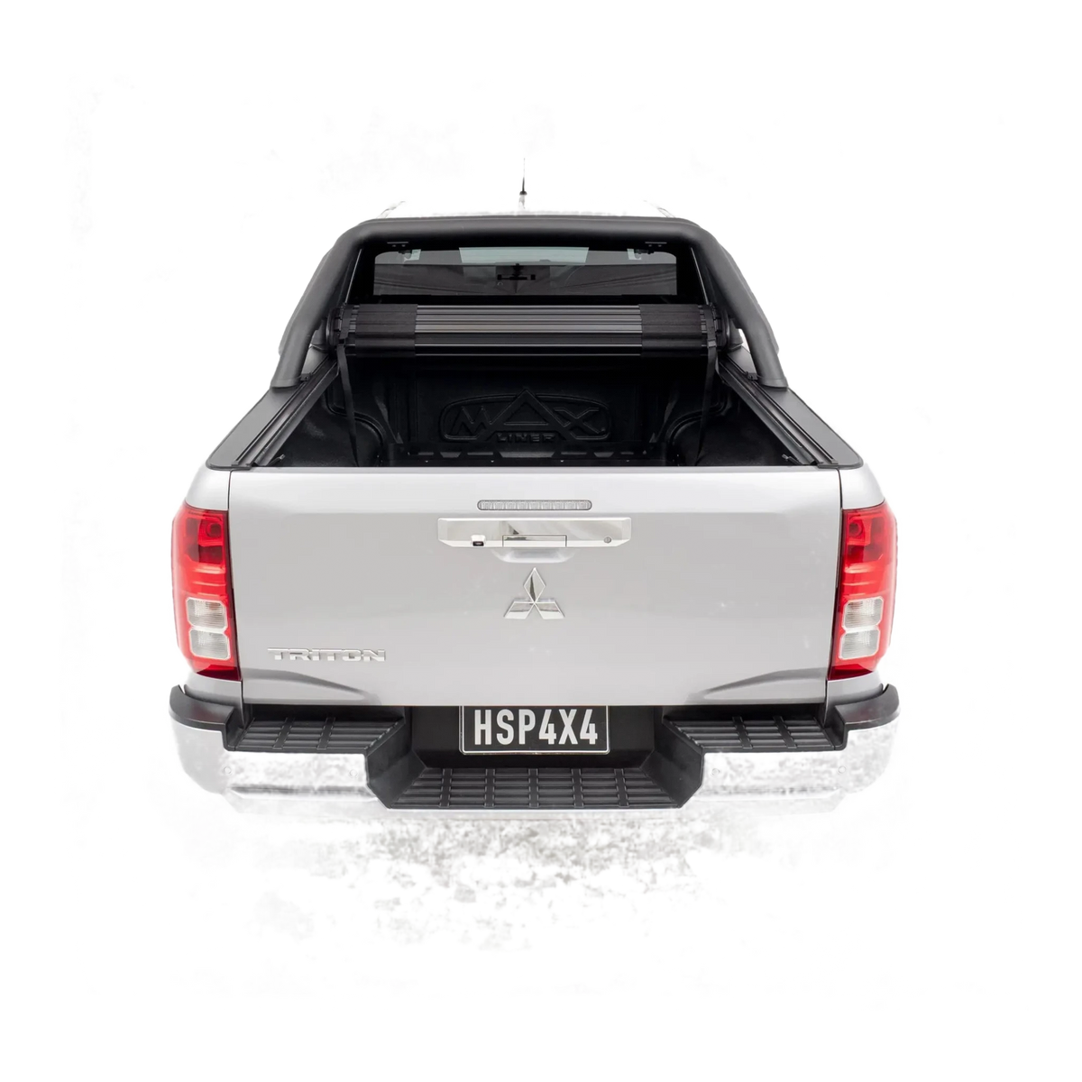 Back view of a silver Mitsubishi pickup truck on a white background