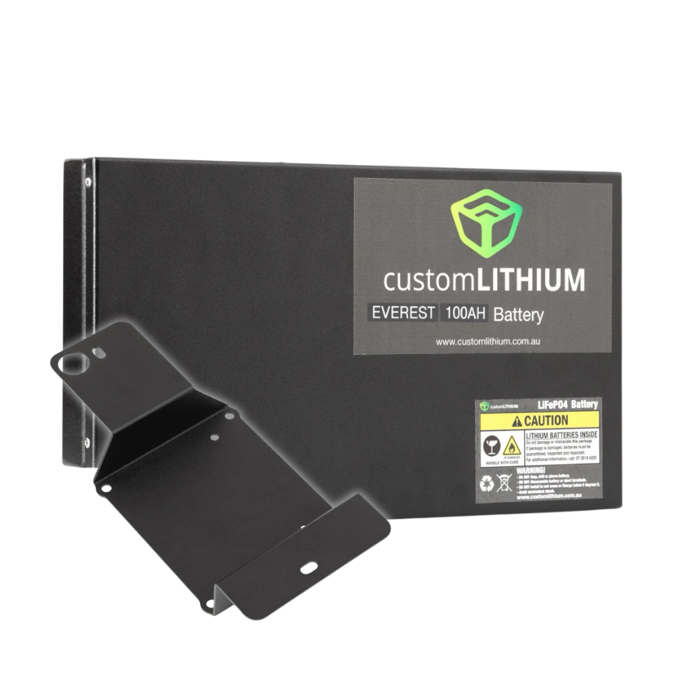 Custom Lithium Everest 100Ah LiFePO4 battery in its black steel case, shown with the black powder-coated mounting bracket that locates it in the Ford Everest, with the caution label warning lithium batteries are inside