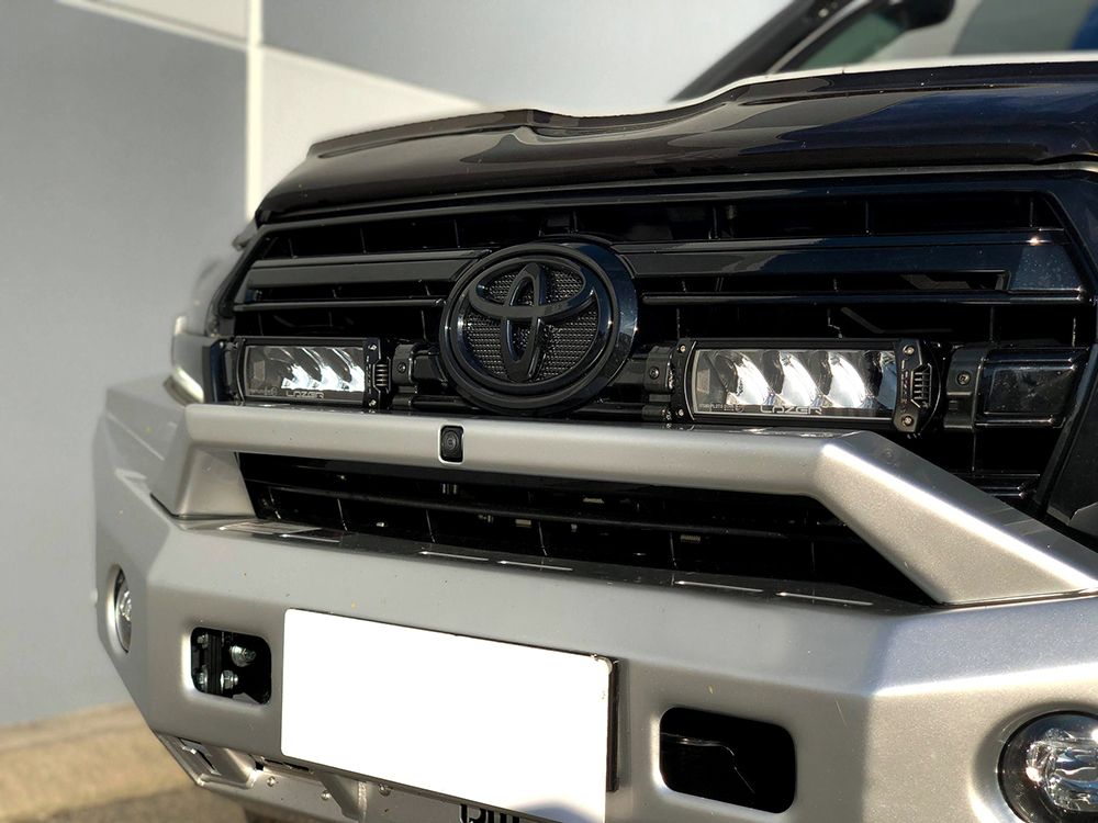 Front view of a Toyota vehicle with clear background