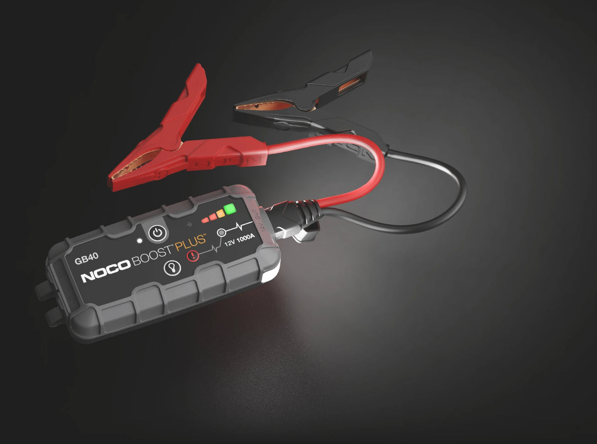 Noco 12V 1000A UltraSafe Lithium Jump Starter – jump starter with clamps and flashlight on