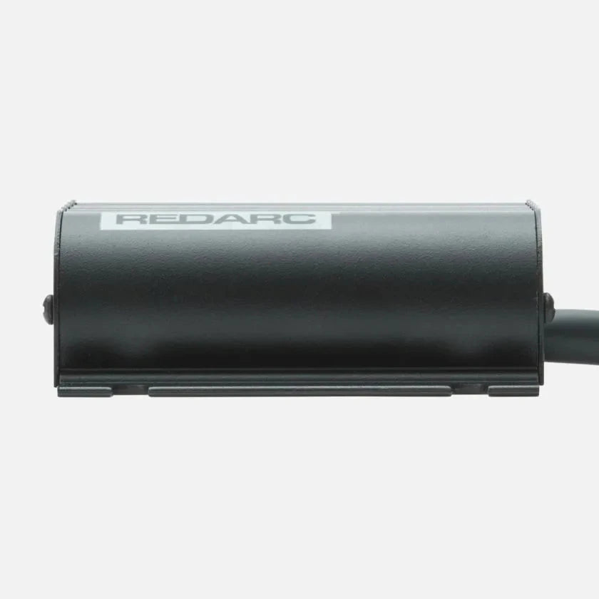 Redarc BCDC1220 three-quarter angle view showing potted fanless construction and mounting feet