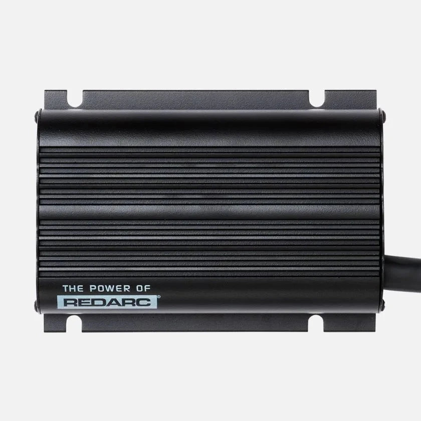 Redarc BCDC1240D under-bonnet DC-DC charger isometric detail in grey enclosure with mounting flanges