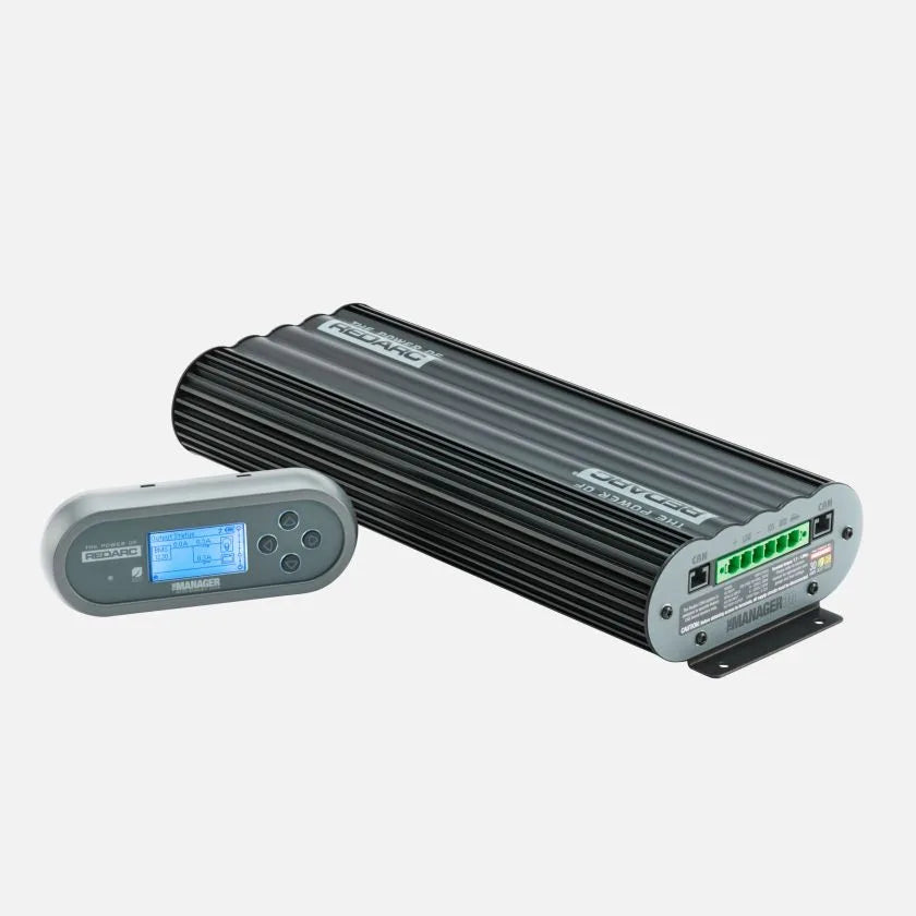 REDARC Manager30 BMS1230S3 and its battery monitor shown together at an angle, with the finned black alloy case and the connector end visible