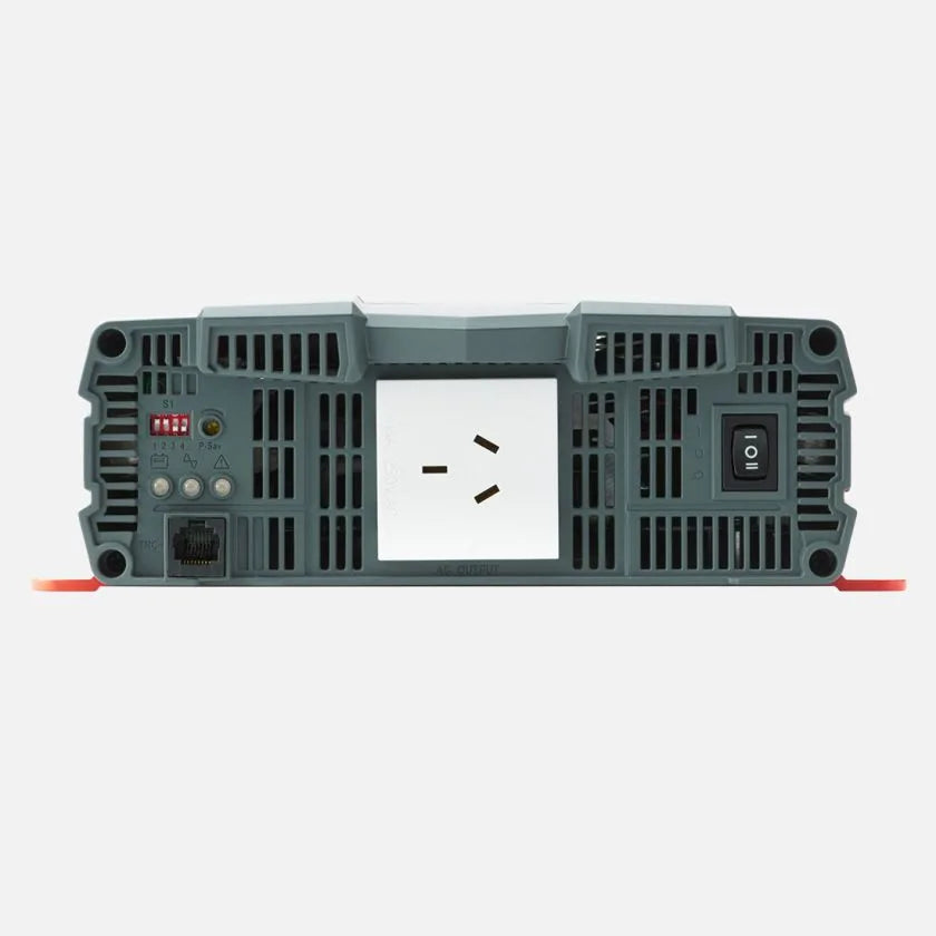AC end of the Redarc pure sine wave inverter, with a single Australian three-pin outlet in the centre, the on-off-remote rocker switch at the right, the status indicator lights and configuration DIP switches at the left, and an RJ45 trigger socket below them