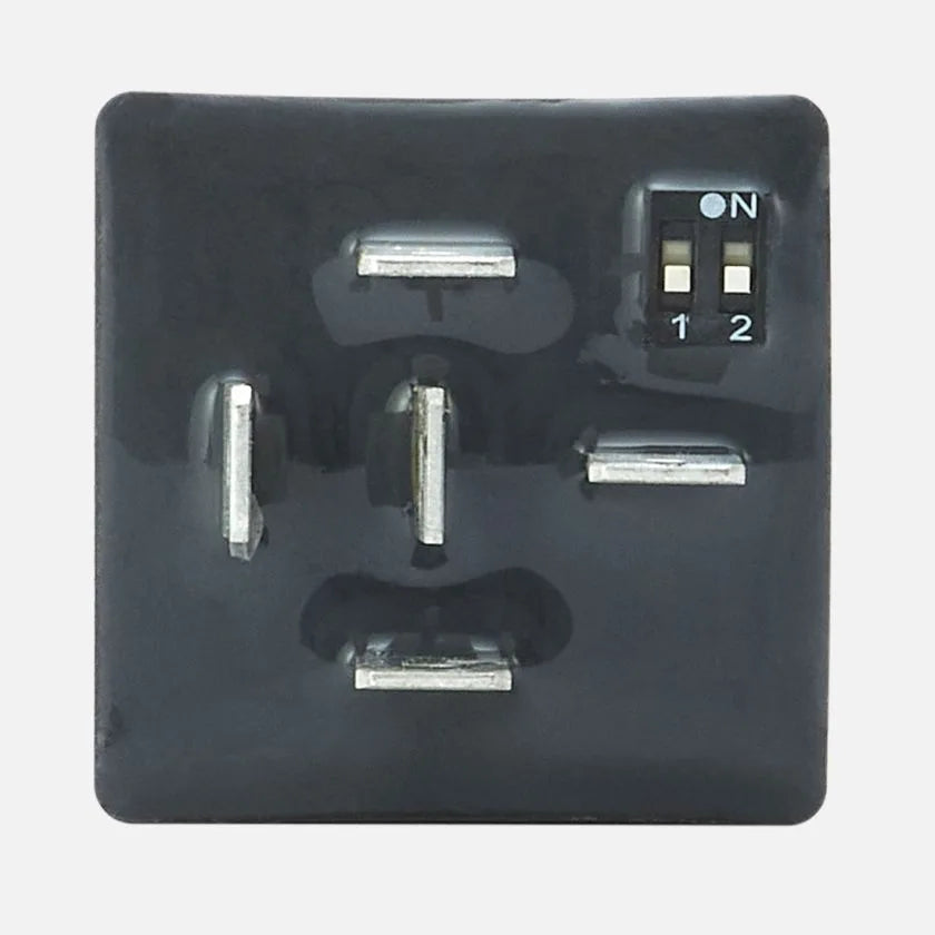 Pin side of the REDARC Multi Function Timer showing the five spade terminals and the DIP switch marked 1 and 2