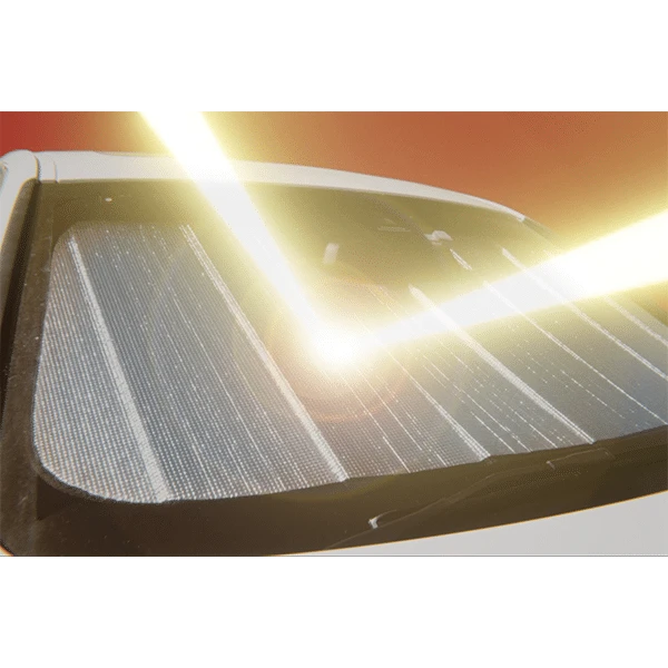 Close-up of the fitted sunshade with sunlight filtering through – SnapShades Front Windscreen Isuzu MU-X, D-MAX