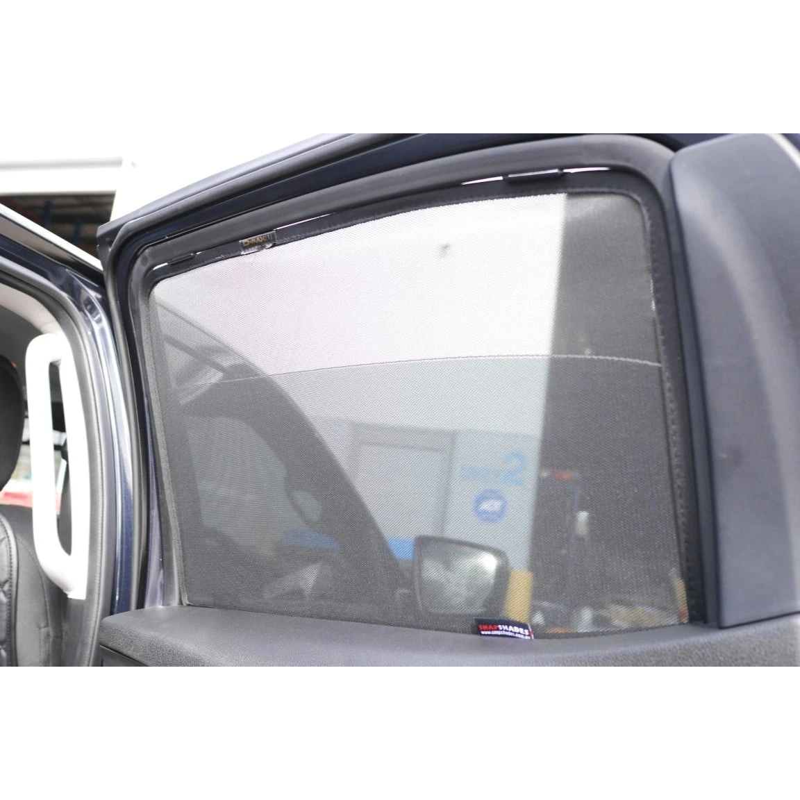 SnapShades Rear Window Shades Isuzu D-MAX RG – shade covering the rear side window, seen from outside