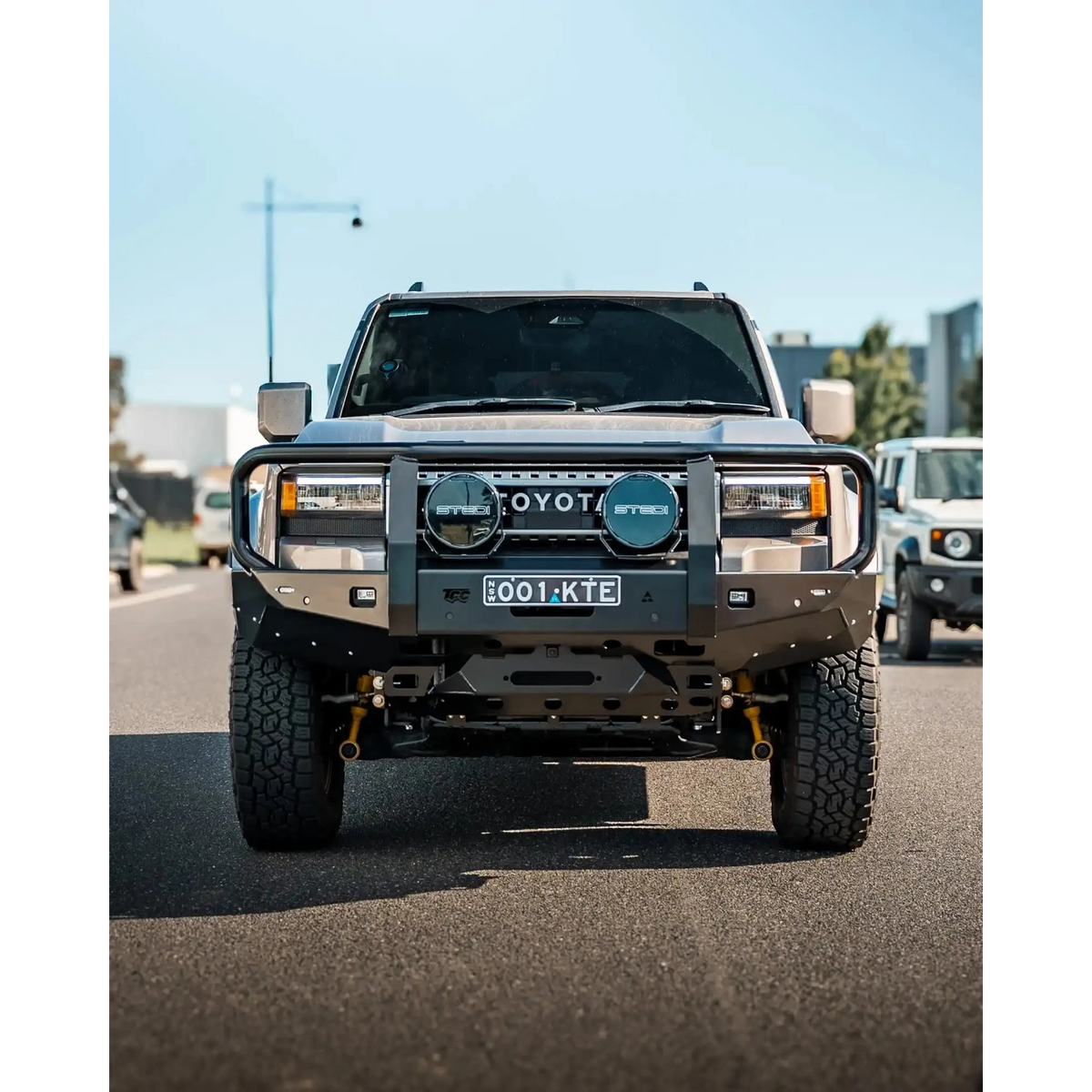 Toyota Prado 250 fitted with the TCC 250 Prado Bull Bar on a road