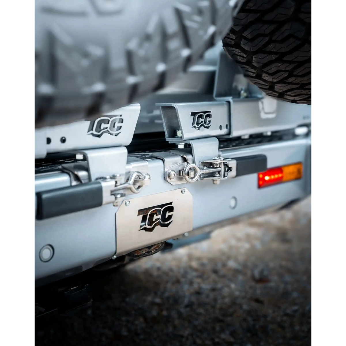 Close-up of a vehicle's hitch receiver with TCC branding – TCC Toyota LC300 Series Rear Bar