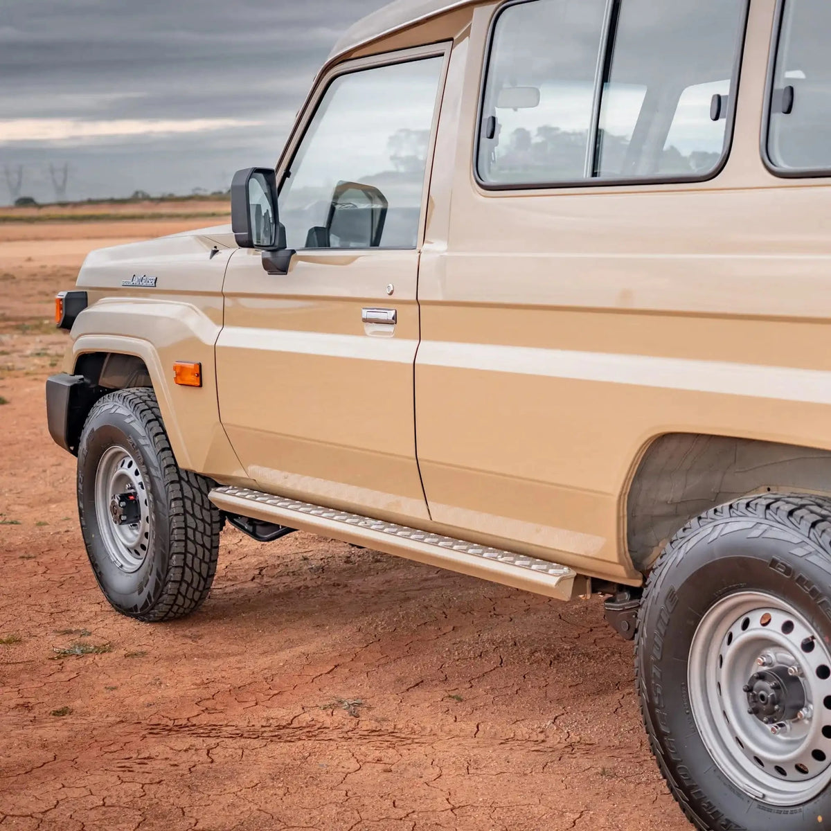 side view of TCC Toyota LC78 Troopcarrier Side Steps