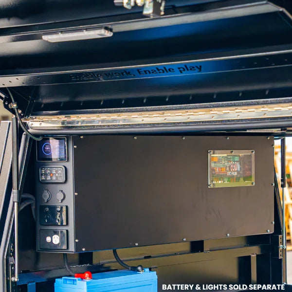 The Prospector mounted high inside a canopy with its control panel and EGON DC Hub window visible and a lithium battery beneath