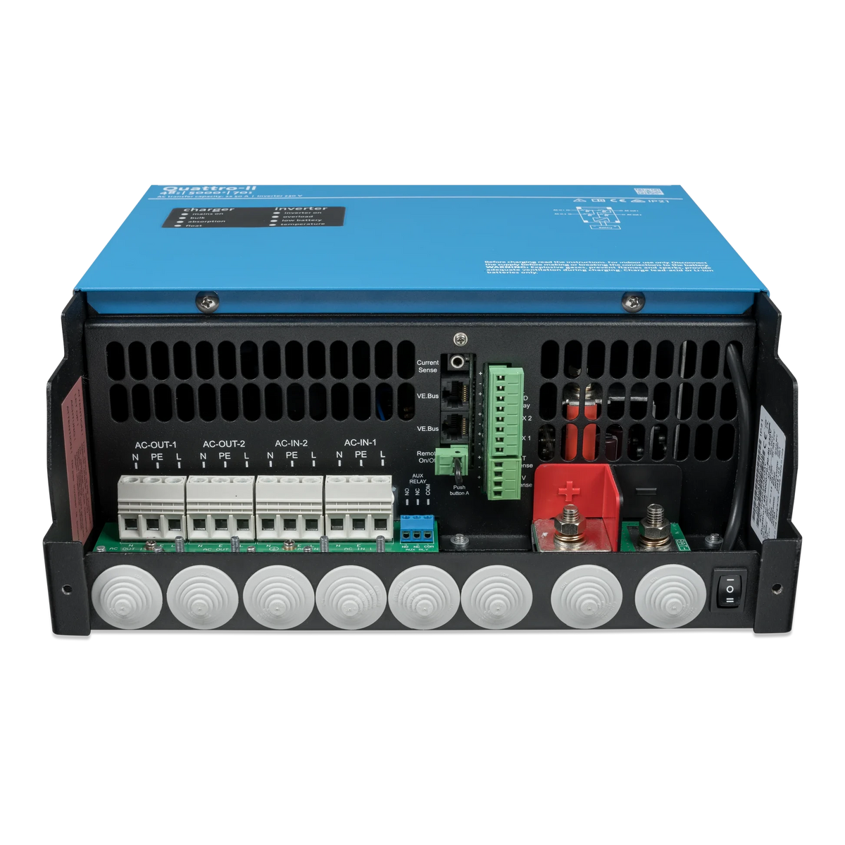 Underside connection bay of a Victron Quattro-II with the cover removed, showing the AC-IN-1, AC-IN-2, AC-OUT-1 and AC-OUT-2 terminal blocks, the VE.Bus sockets and the red and black battery studs