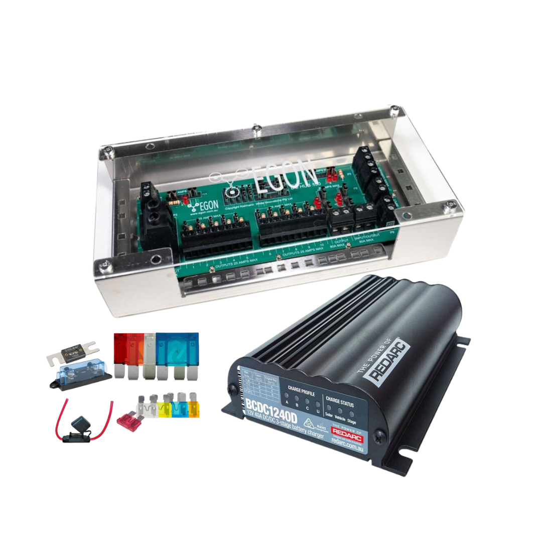 BCDC1240D kit shown without an inverter: the EGON DC Hub in its clear-lidded case above a Redarc BCDC1240D charger, an ANL fuse and holder, and a set of blade and mega fuses