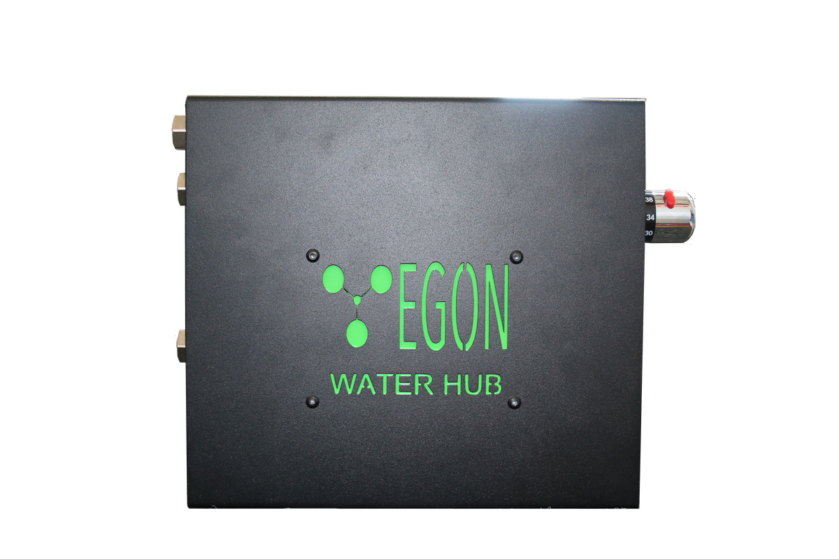 The EGON Water Hub square on to the cover face, showing the green logo, the three plumbing ports down the left edge and the thermostatic mixing valve projecting from the right