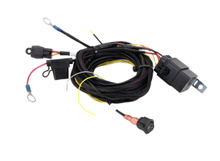 An assortment of Lazerlamps wiring kits including various connectors, cables, a relay, and fuses.