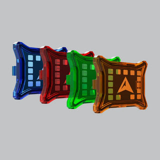 Four rock light covers in a row, blue, red, green and amber, each translucent panel showing the LED pattern with the ALTIQ arrow raised on the front