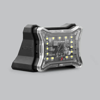 ALTIQ 30 degree angle mount fitted behind a Spectrum Pro rock light, the black moulded wedge carrying the ALTIQ name with the light seated on its face