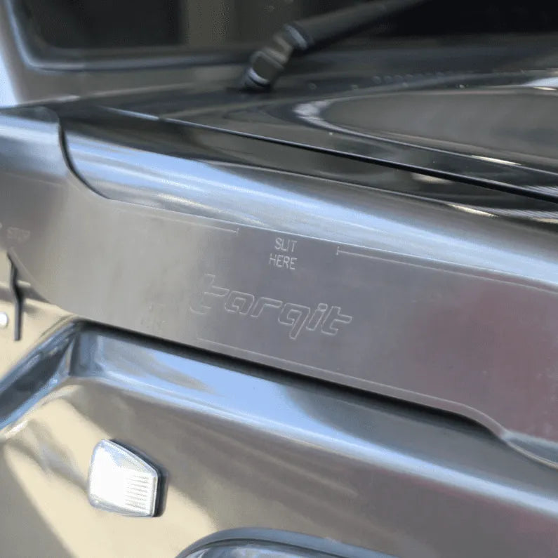 Close-up of a template with 'torqit' branding.