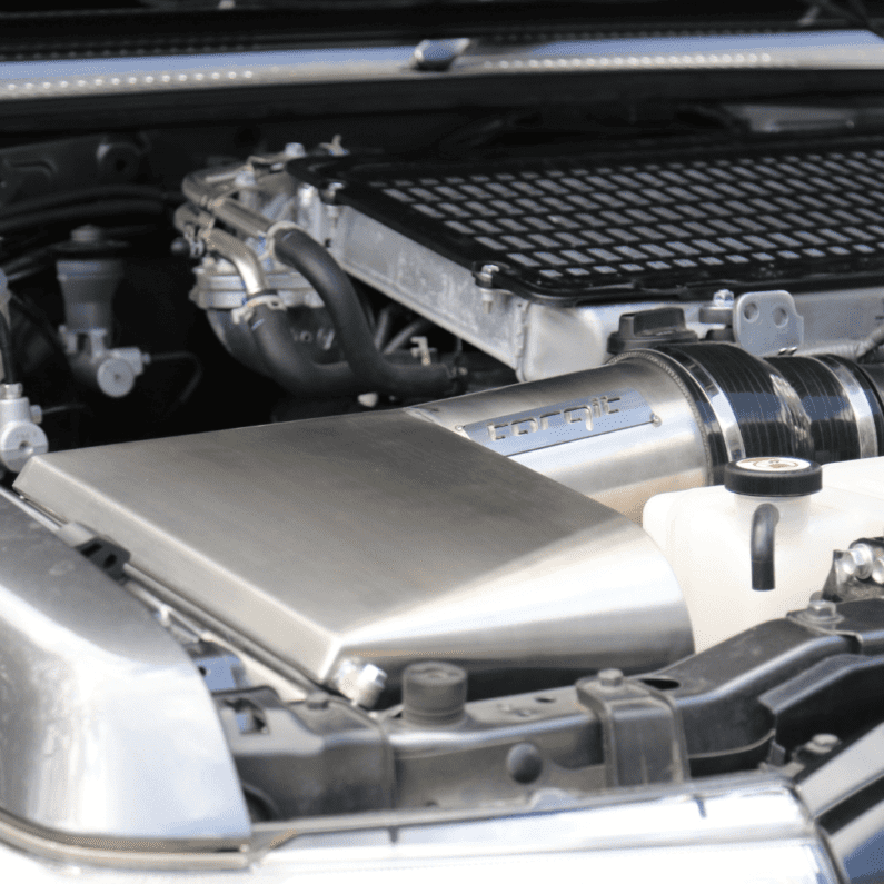 Close-up of a car engine with visible components