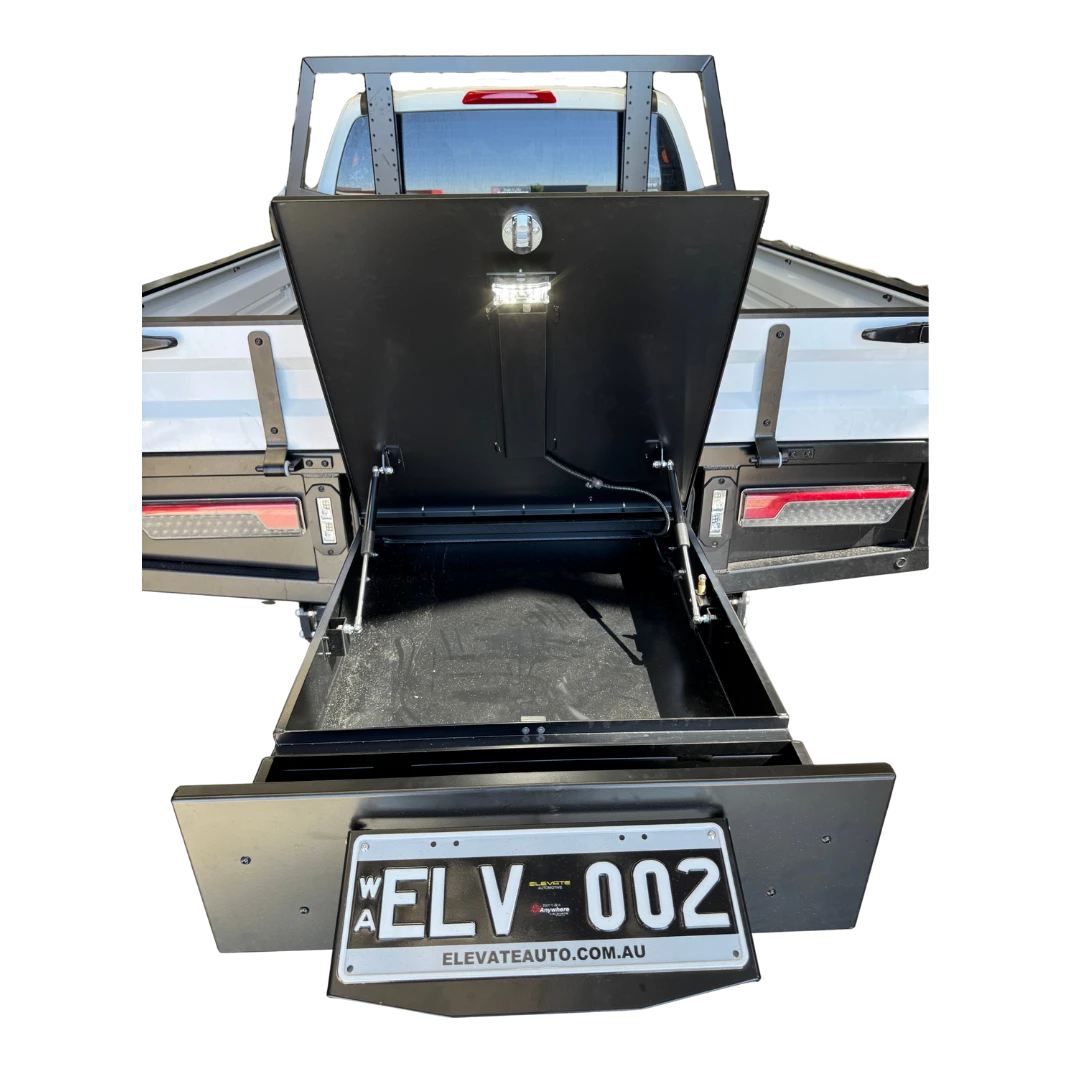Open truck bed with black toolbox and 'ELV 002' license plate on a white background – Dual Cab 1800mm Aluminium Tray with 1m Trundle Drawer 50L Water tank & Colour Coded Tray Sides