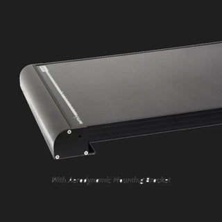 Corner of the panel fitted with the aerodynamic mounting bracket, the curved extrusion screwed to the frame so the leading edge sits flush and low