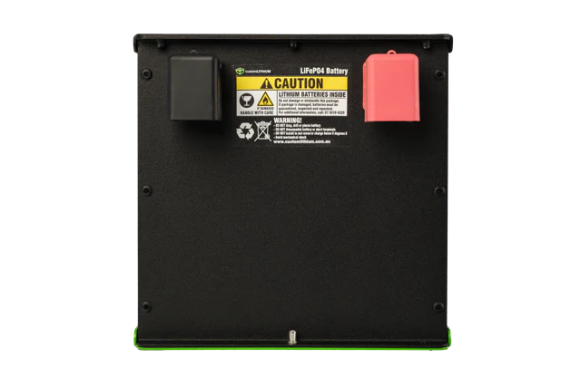 Black battery pack with warning label on a white background