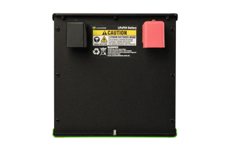Black battery pack with warning label on a white background