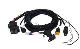 An assortment of Lazerlamps wiring kits including various connectors, cables, a relay, and fuses.