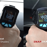Comparison of a digital thermometer held by a hand with and without Snap Shades in a car interior.