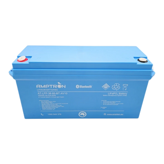 Amptron AT-LFP-36-85-BT-AV10 lithium battery face on, the blue case labelled 3264Wh 38.4 volt 85Ah lithium deep-cycle battery with Bluetooth, LiFePO4 and battery management system inside, the specification and caution panels below, and the red and black terminal covers on top