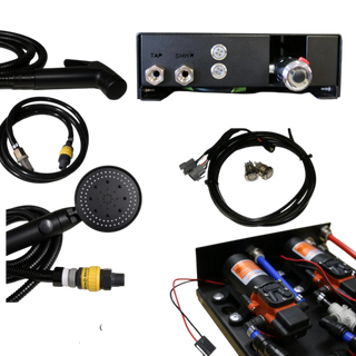 The Water Hub, electrical kit and hose kit shown together on a plain background: the hub, shower hose and rose, tap hose with quick-connect fitting, the wiring loom with two switches, and the twin pumps inside the open hub